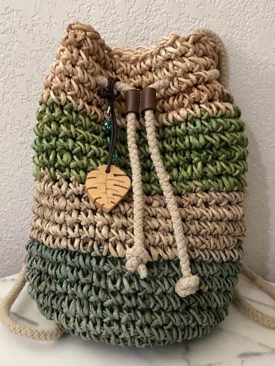 Hand crafted drawstring back pack,artisan style,raffia material,wood leaf charm main image 5
